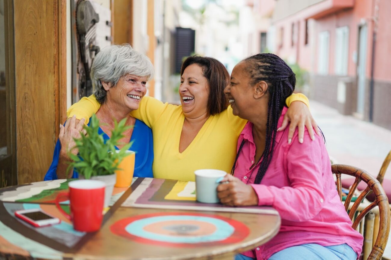 three elderly women at lunch